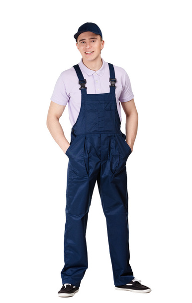 Workman in overalls - Фото, изображение