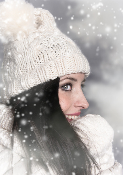 Portrait of attractive young woman in winter - Фото, изображение