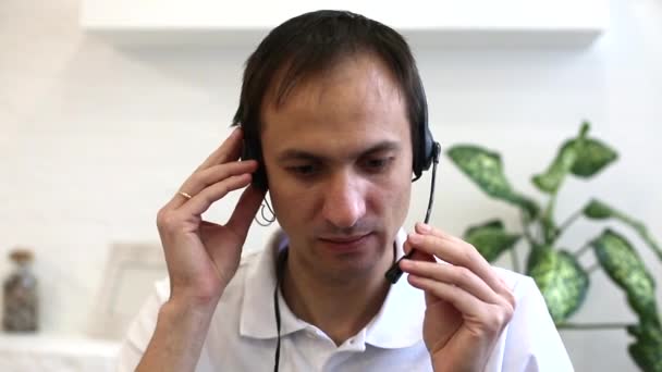 man having video call, wearing headphones  - Footage, Video