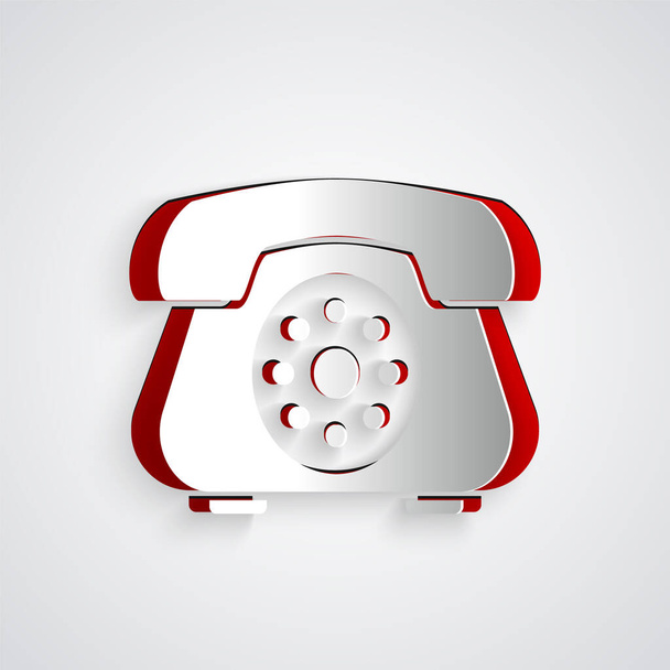 Papiergeschnittenes Telefon-Symbol isoliert auf grauem Hintergrund. Festnetztelefon. Papierkunst. Vektorillustration - Vektor, Bild