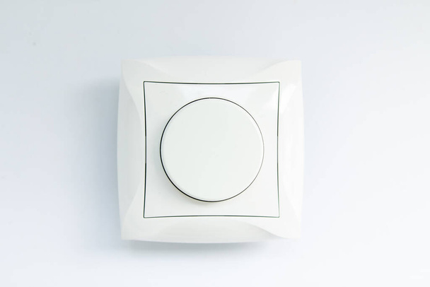 round light switch on a white background - Foto, Imagen