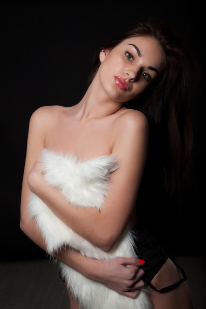 Girl covers her bare chest fur cape - Photo, Image