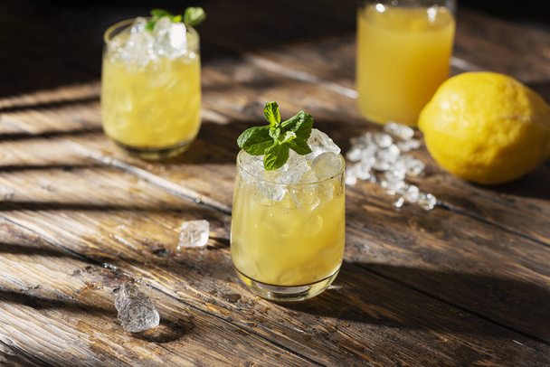 Summer cold cocktail with strong sun lights, selective focus image - 写真・画像