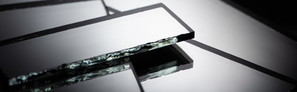 close up view of square mirror pieces in stack, panoramic shot - Fotografie, Obrázek