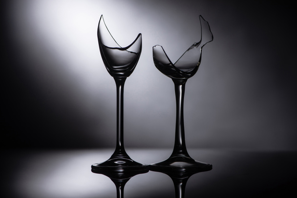 broken sharp transparent glasses in dark - Valokuva, kuva