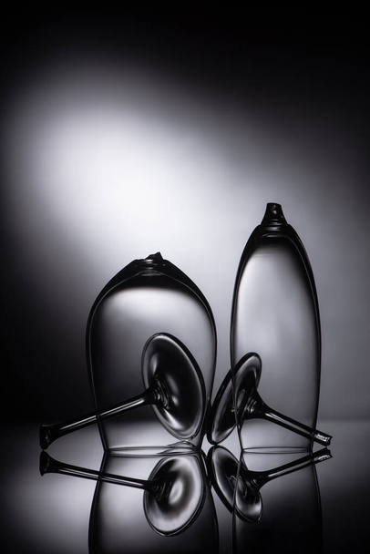broken sharp transparent glasses in dark - Photo, Image