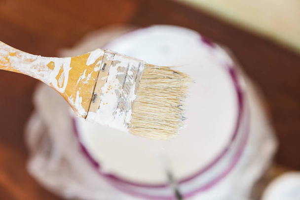 Home renovation, walls color change, diy concept. White paint with essentials equipment. - Φωτογραφία, εικόνα