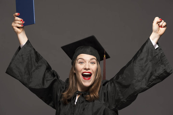 Happy smiling graduate female student - Φωτογραφία, εικόνα