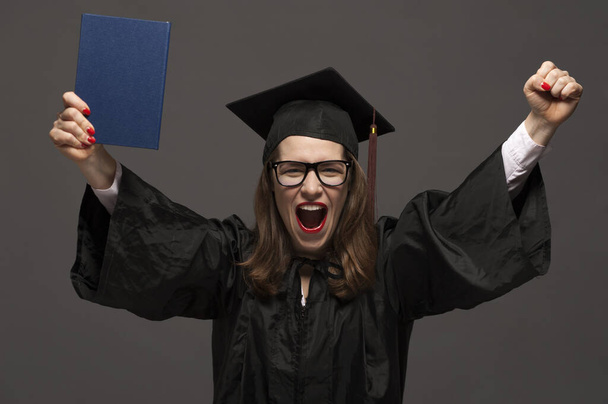 Happy smiling graduate female student with diploma - Фото, зображення
