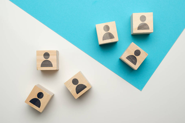 Team competition concept at work with icons on wooden blocks. Close up. - Fotoğraf, Görsel