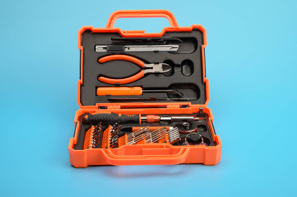 A set of professional tools in a case for repairing phones, smartphones, computers and other office equipment. - Photo, Image