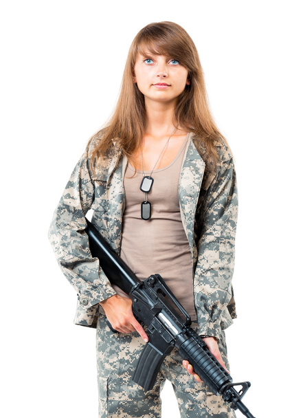 elinde silah olan bir kamuflaj giysili asker genç beautyful kız - Fotoğraf, Görsel