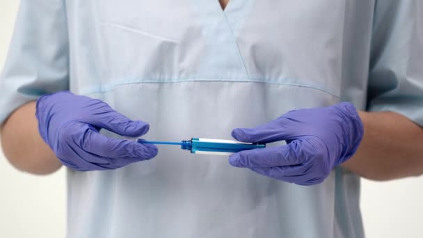 Epidemiologist holds test for coronavirus covid 19. A swab for infection. - Footage, Video