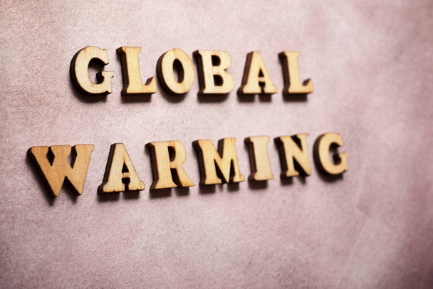 Global warming text on a colored paper. - Фото, зображення