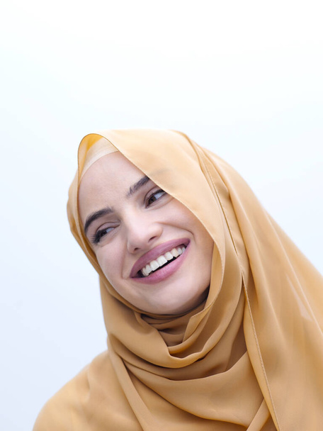 portrait of beautiful muslim woman in fashionable dress with hijab isolated on white background representing modern islam fashion and ramadan kareem concept - Zdjęcie, obraz