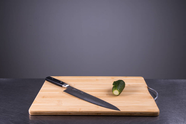 cucumber on a cutting board in a restaurant kitchen - Fotografie, Obrázek