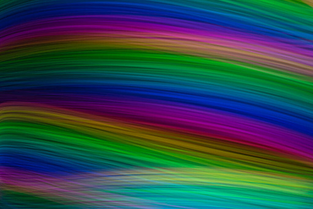 разноцветная красочная неоновая световая живопись фотография, длительная экспозиция, рябь и волны на фоне
 - Фото, изображение