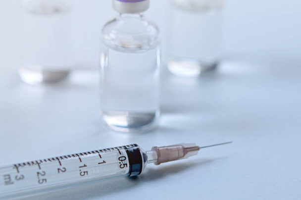 Medicine in vials and syringe , ready for vaccine injection , Cancer Treatment , Pain Treatment and can also be abused for an illegal use, healthcare and medical concept vaccination. - Photo, image