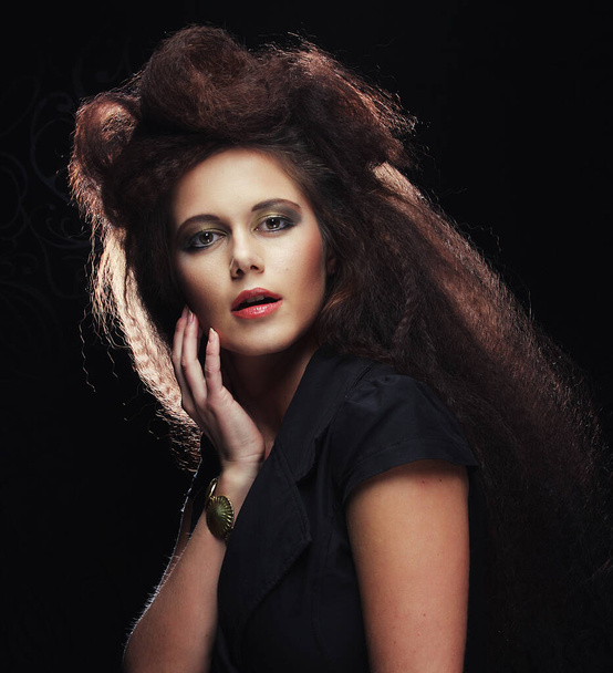 Beautiful young woman with magnificent hairdo - 写真・画像