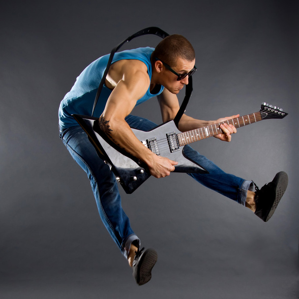 Guitar player jumps - Photo, Image