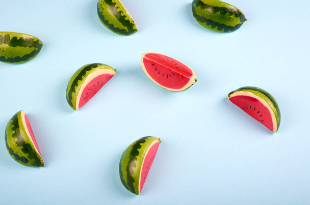 Watermelon slices composition on color background. Flat lay and overhead image. - 写真・画像