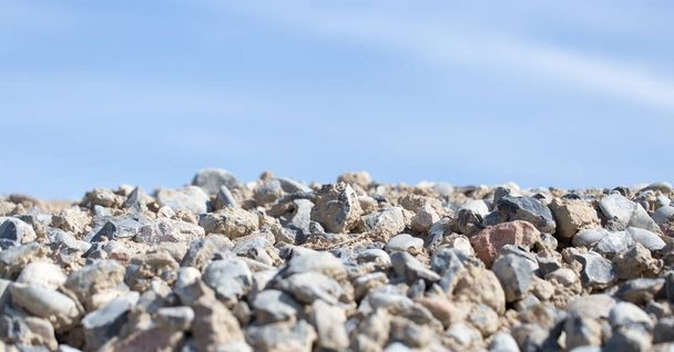 stones on nature on a background of blue sky . - Foto, Bild