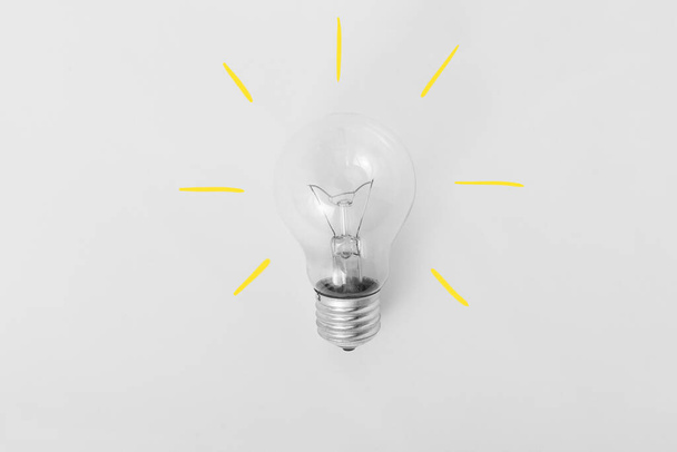 Glowing yellow light bulb, busienss idea concept - Фото, зображення