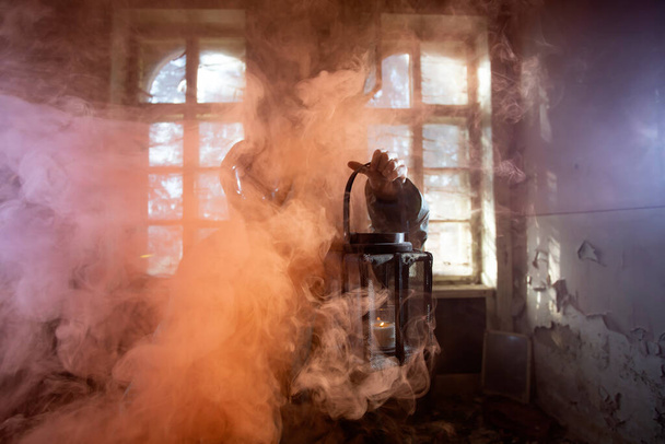 Post apocalyptic survivor in gas mask in the smoke. Environmental disaster, armageddon concept. - Фото, зображення