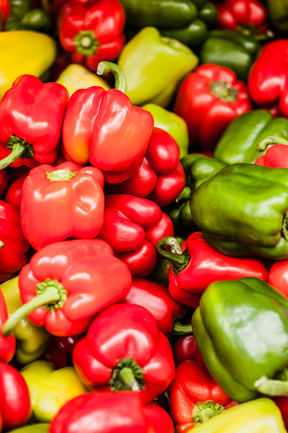 Red, green and yellow sweet bell peppers natural background. - Photo, Image