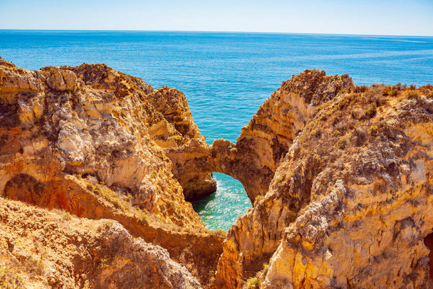 The coast of the Algarve in southern Portugal near Lagos - Фото, изображение