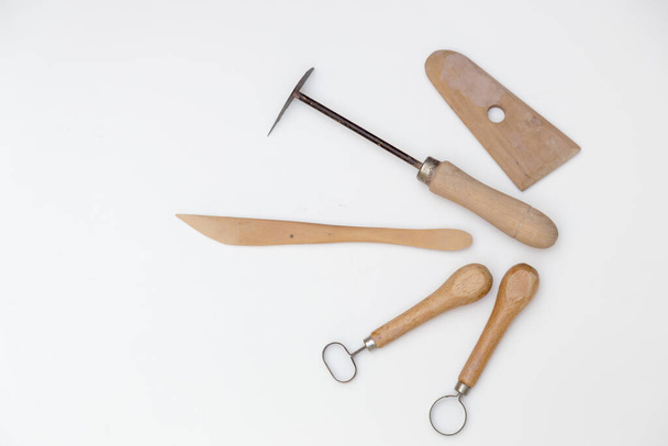 set of modeling tools for ceramic, cutters, stick, trowel and others, on white background - Photo, Image