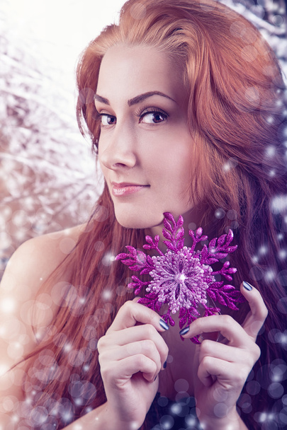 Woman with snowflake - Foto, Imagen