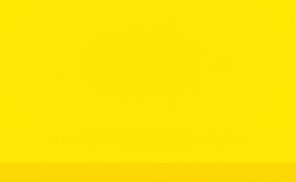 Solide abstrait de jaune brillant dégradé studio mur fond de salle. - Photo, image