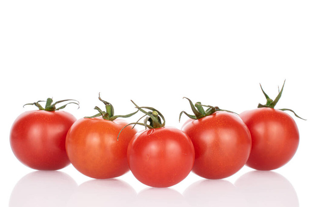 Group of five whole fresh red cherry tomato isolated on white - Fotoğraf, Görsel