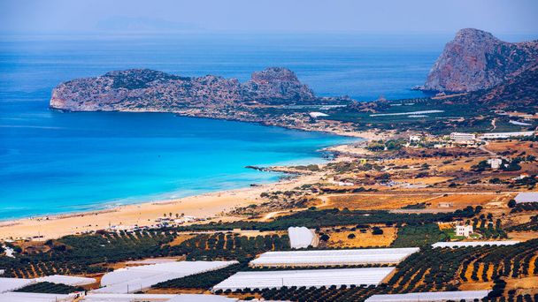 Shot of beautiful turquoise beach Falasarna (Falassarna) in Crete, Greece. View of famous paradise sandy deep turquoise beach of Falasarna (Phalasarna) in North West, Crete island, Greece. - Photo, Image