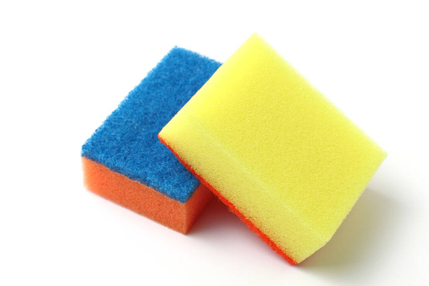 Bright colored kitchen sponges, close-up, white background. - Photo, image