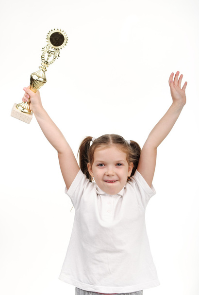 Young girl holding her trophy. - 写真・画像