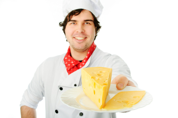 Cook holding cheese stack. - Foto, immagini