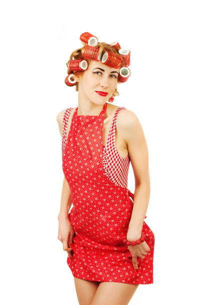 Bonita ama de casa en vestido rojo
 - Foto, imagen