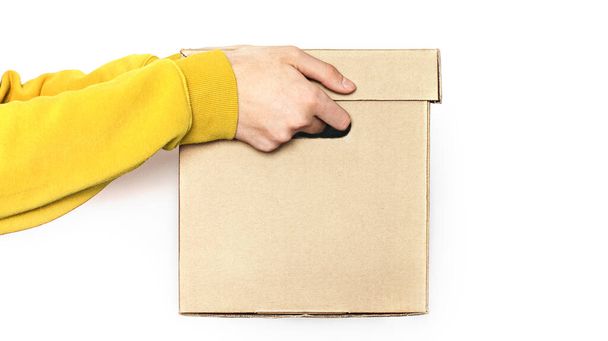 cFood delivery. A man in holds a box. isolate copy space.  - Photo, Image
