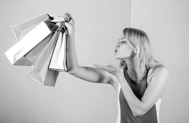 Black friday. Happy shopping day. Retail and consumerism. In love with her purchase. Save money. Easy way of shopping. Woman on shopping tour. Girl with paper bags. Discounts and loyalty program - Foto, afbeelding