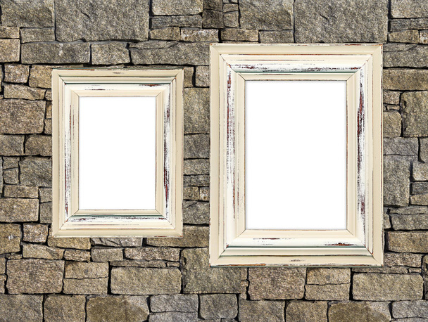 Two old wooden frames on a stone wall - Photo, Image