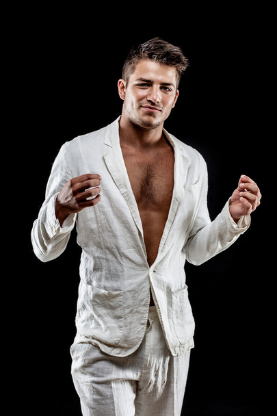 Young man wearing white suit - Foto, immagini