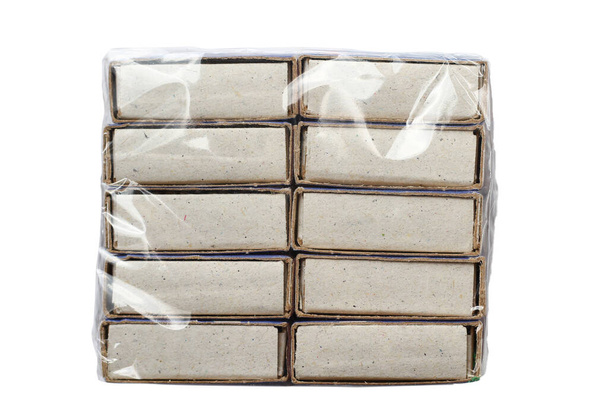 Embalaje de fósforos en polietileno sobre fondo blanco, aislado
 - Foto, Imagen