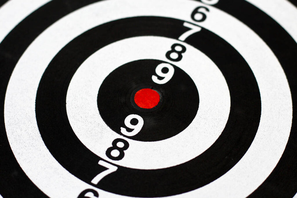 Target Darts. Red center, a dozen. Metaphor of success and achievement plans, background - Fotó, kép