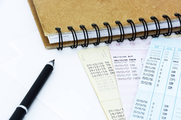 saving account passbooks with pen and notebook for financial planning concept - Foto, immagini