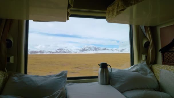 CLOSE UP: Stunning view of snowy Himalaya from the comfort of overnight train. - Footage, Video
