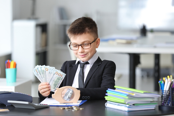 Little accountant working in office - Photo, Image