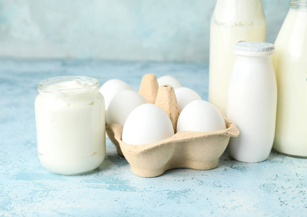 Different dairy products on color background - Photo, Image