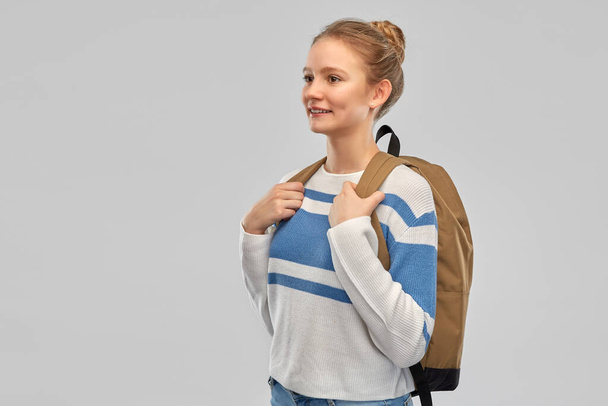 smiling teenage student girl with school bag - Zdjęcie, obraz